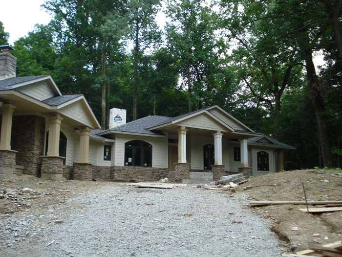 View of Exisitng Home and New Addition with New Entry